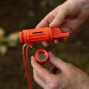 imageCoghlans 5in1 Survival Aid Kit  Compact Emergency Tool with Waterproof Matchbox Compass Fire Starter Signal Mirror and Whistle for Camping Hiking Outdoors and Emergency Preparedness